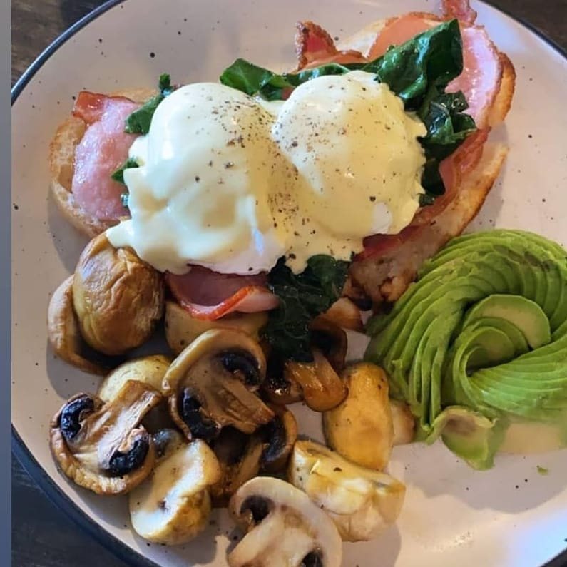 Eggs benny with bacon, mushrooms and avocado
